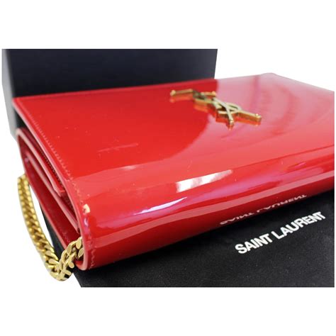 ysl patent red bag|YSL baguette bag.